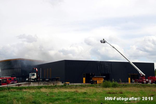 Mens molen prins Grote brand bij Kors Hoogwerksystemen in Steenwijk - HW-Fotografie